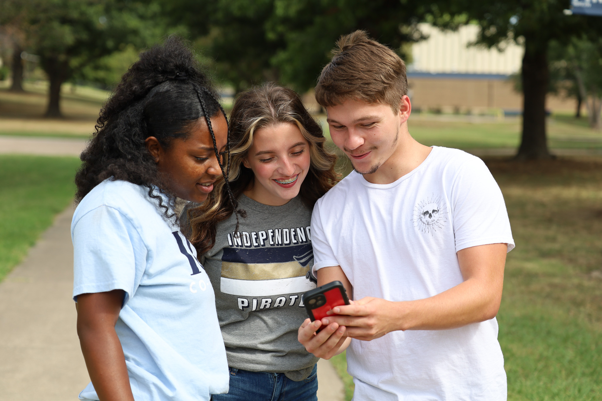 students looking at a phone