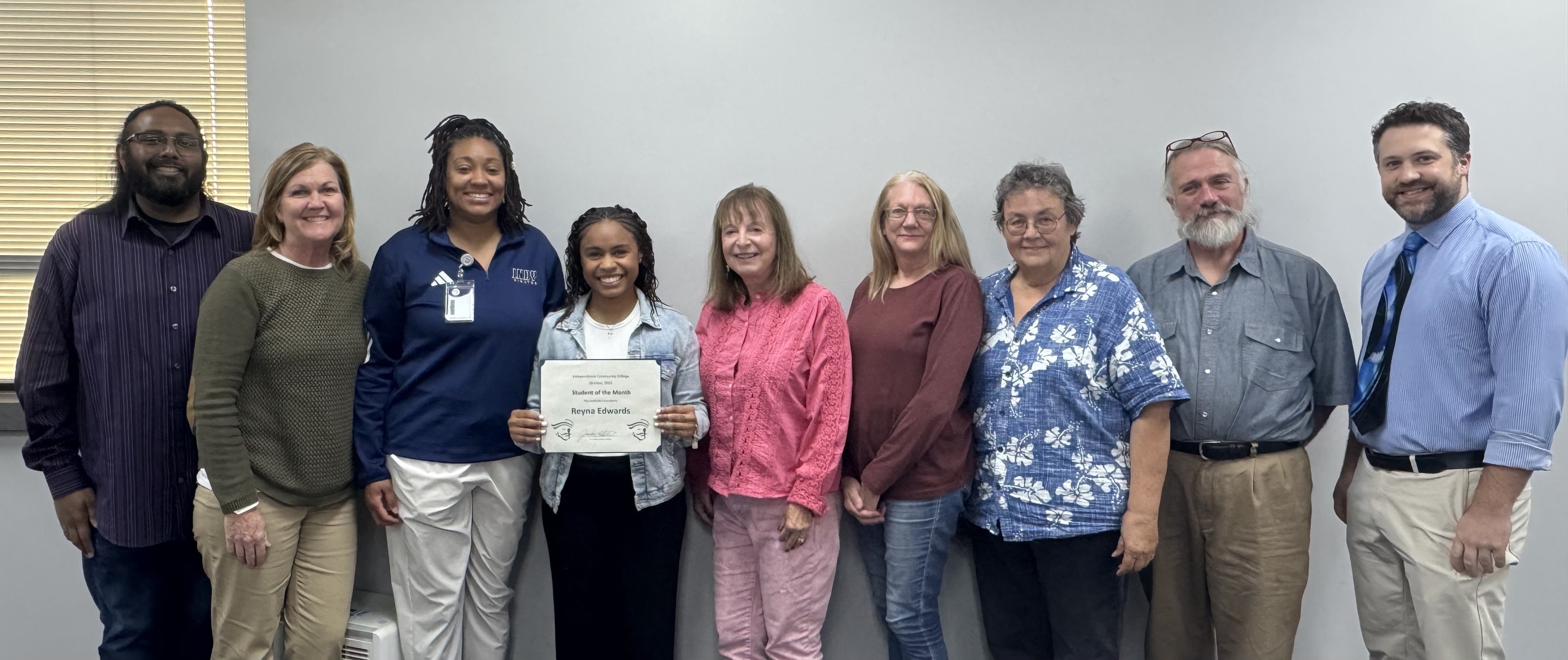 Reyna Edwards being recognized at October's Board Meeting 